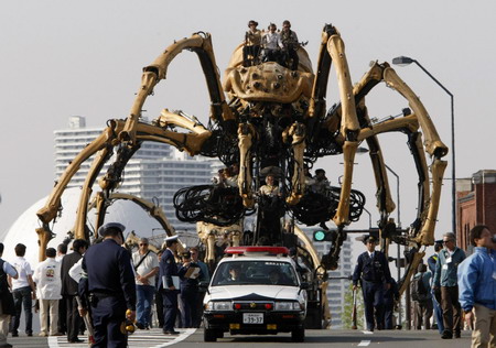 Giant mechanical spiders turn out for celebration