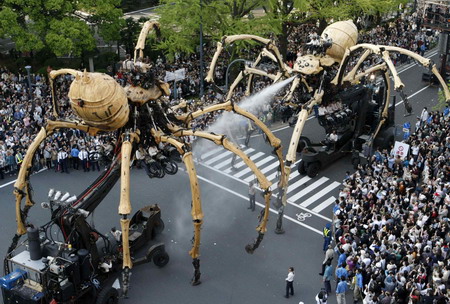 Giant mechanical spiders turn out for celebration
