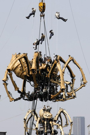 Giant mechanical spiders turn out for celebration