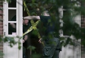 Georgia professor sought in shooting death of wife, two others