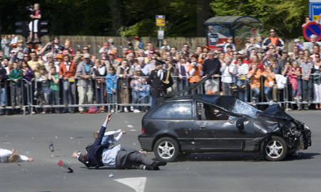 Car hits crowd watching Dutch queen, kills 5