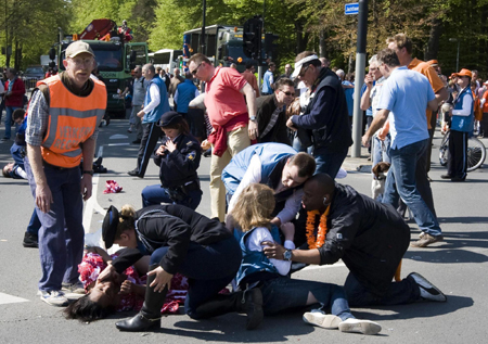 Car hits crowd watching Dutch queen, kills 5