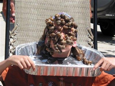 43 snails on his face? Boy hopes he set a record
