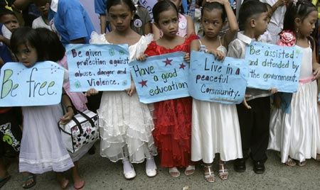 Children protest against child porn in Manila