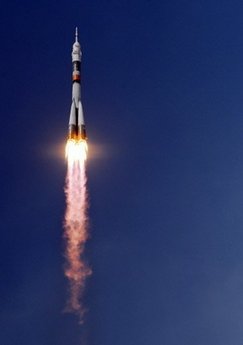 Russian manned spaceship docks with space s