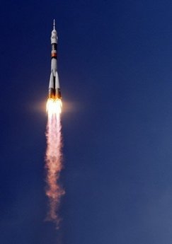 Russian manned spaceship docks with space station