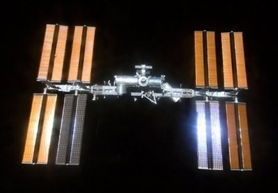 Russian manned spaceship docks with space station
