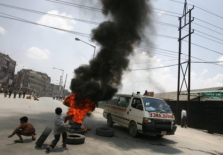 Strikers vandalize vehicles in Nepali capital