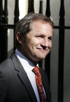 Another minister quits UK govt, tells Brown to go