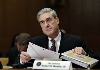 FBI director defends use of informants in mosques