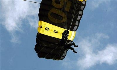 Bush celebrates 85th by skydiving over Maine