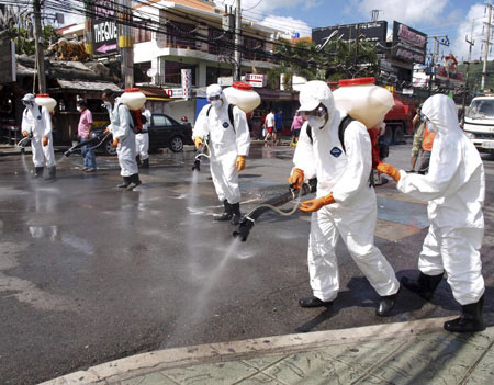 Thai streets disinfected as flu patients number rises to 310