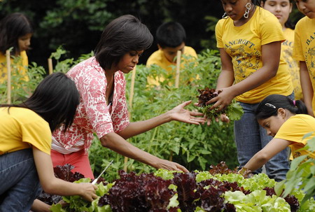 US 1st lady enjoys vegetable harvest with schoolkids