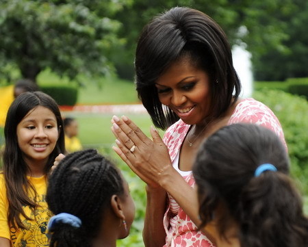 US 1st lady enjoys vegetable harvest with schoolkids