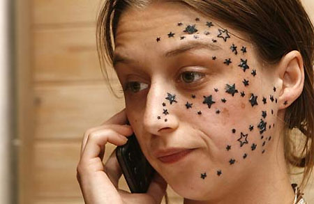 Tattoos leave Belgian teenager star-faced. Belgian Kimberley Vlaeminck, 18, 