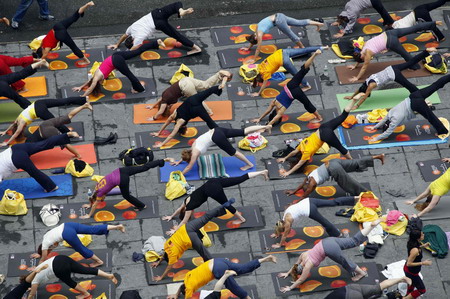 New Yorkers practice yoga on summer solstice
