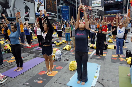 New Yorkers practice yoga on summer solstice