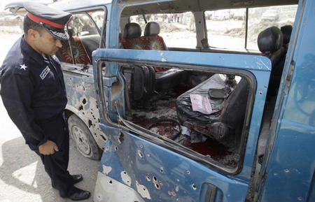 Bombs hit Baghdad, at least 13 killed