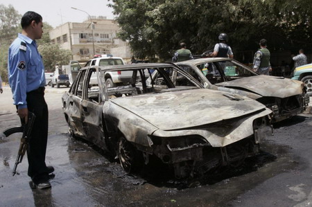 Bombs hit Baghdad, at least 13 killed