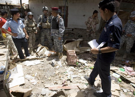 Bombs hit Baghdad, at least 13 killed