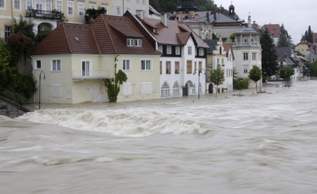 8 die in floods, central Europe on alert