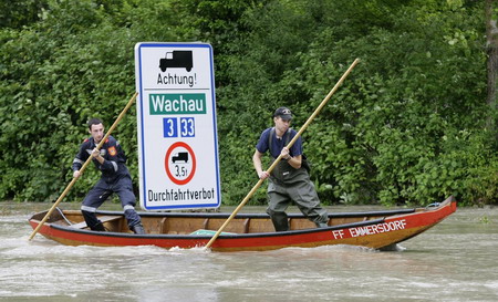 8 die in floods, central Europe on alert