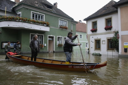 8 die in floods, central Europe on alert