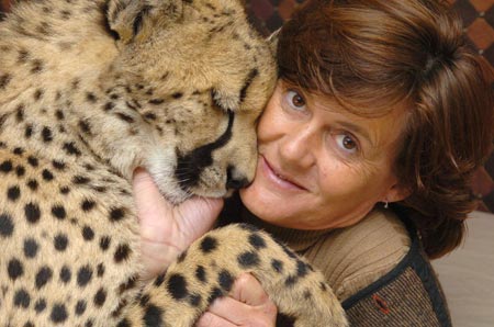 Woman shares home with 11 wild cats in S Africa
