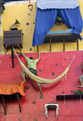 Going vertical: 2 brothers live on building's wall