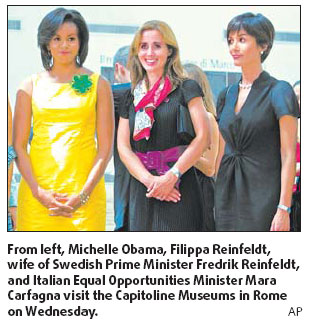 'Model' minister guides G8 spouses