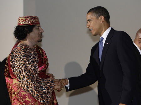 Obama, Gaddafi shake hands at G8 dinner