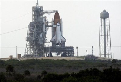 Thunderstorms delay space shuttle launch again