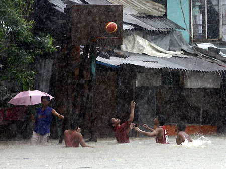 Tropical storm 'Seven' floods Manila streets