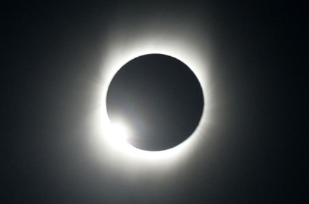 Longest 21st century solar eclipse envelops Asia in darkness
