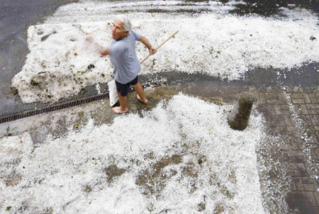Garden covered with hailstones in Les Esserts