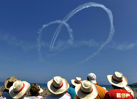 Aerial exhibition over San Lorenzo beach in Spain