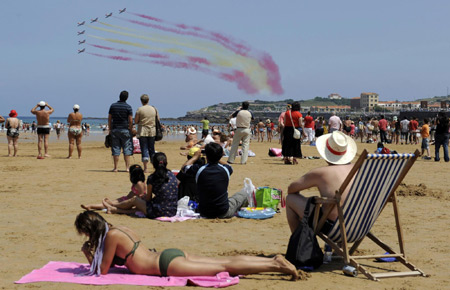 Aerial exhibition over San Lorenzo beach in Spain