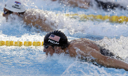 Phelps reels in Cavic to stay butterfly king in Rome