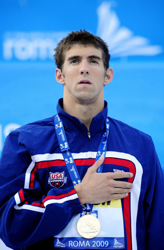 Phelps reels in Cavic to stay butterfly king in Rome