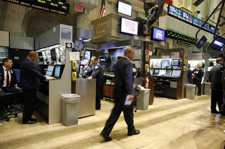 S&P tops 1,000 benchmark for 1st time in 9 months