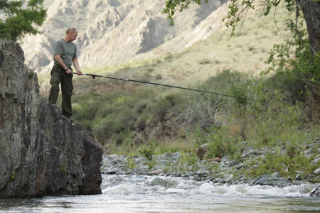 Russia's Putin fishes in Siberia