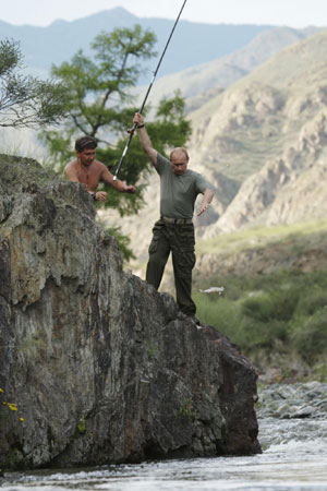 Russia's Putin fishes in Siberia