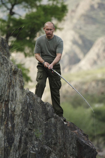 Russia's Putin fishes in Siberia