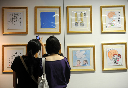 Japanese cartoonists hold antiwar exhibition in China