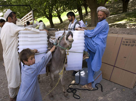 Afghans use donkeys to carry election ballot boxes
