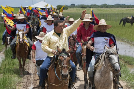Venezuela's President rides horse during weekly broadcast