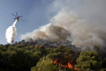 Wildfires in Greece mostly under control