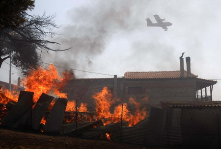 Wildfires in Greece mostly under control
