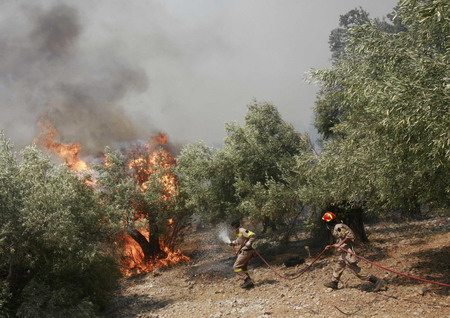 Wildfires in Greece mostly under control