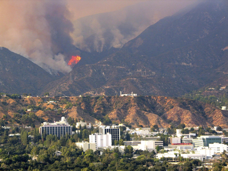Calif. firefighters wage fierce wildfire battles